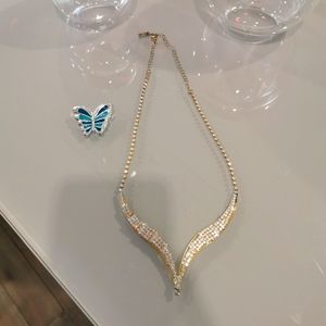 Bundle of necklace and a butterfly brooch